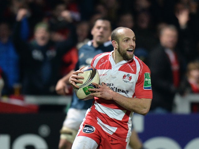 Charlie Sharples of Gloucester runs in to score their first try during the Heineken Cup Pool Six match between Gloucester and Munster at Kingsholm Stadium on January 11, 2014