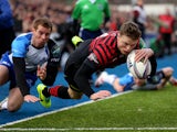Saracens' Chris Ashton dives over to score his team's first try against Connacht during their Heineken Cup match on January 18, 2014