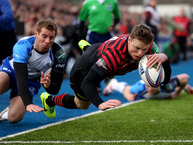 Saracens' Chris Ashton dives over to score his team's first try against Connacht during their Heineken Cup match on January 18, 2014
