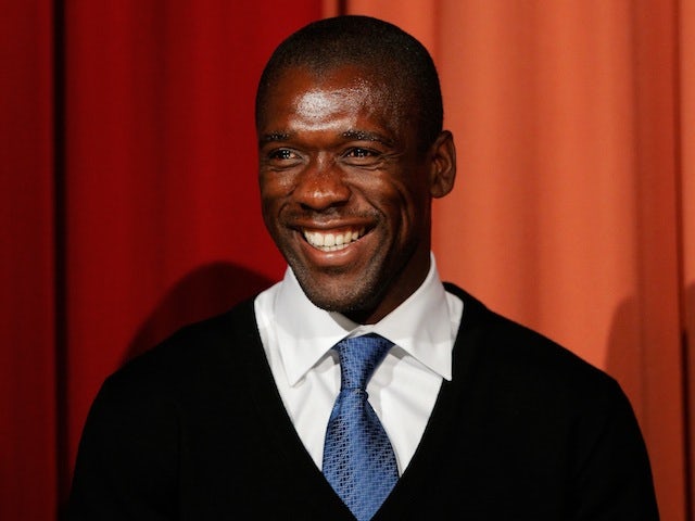 Clarence Seedorf is pictured on stage during the Laureus European Workshop and Project Visit held at Almere Echnaton school on December 12, 2013
