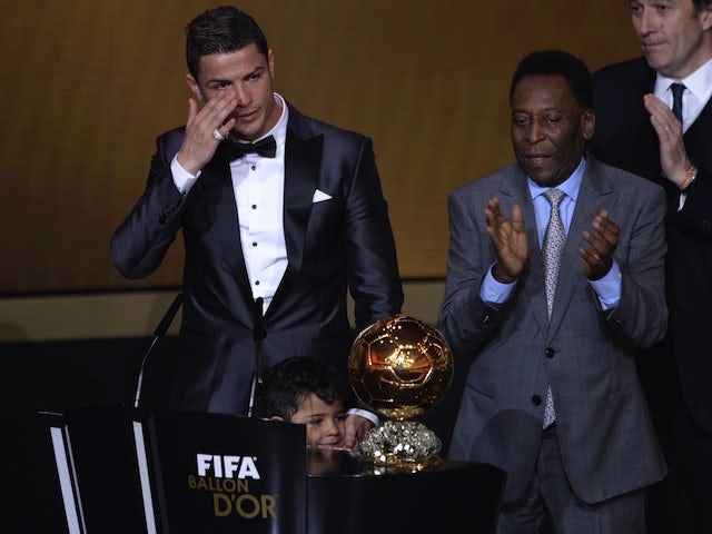 Cristiano Ronaldo wells up on stage after being awarded FIFA's Ballon d'Or prize in Zurich on January 13, 2014