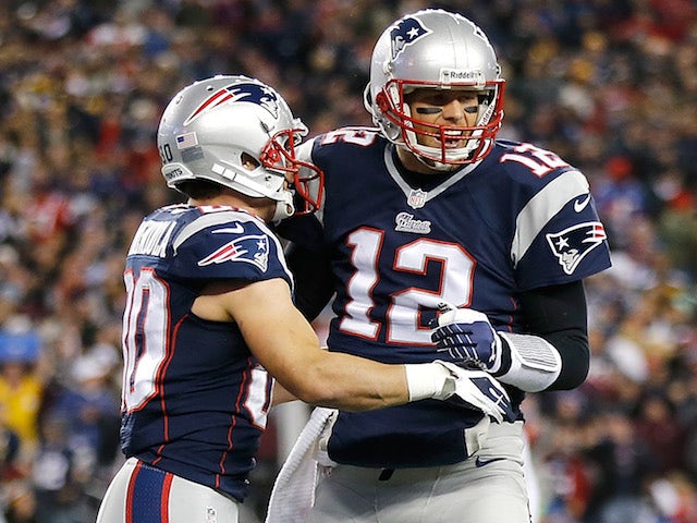 Danny Amendola of the New England Patriots celebrates his touchdown with Tom Brady in the first quarter during a game with the Pittsburgh Steelers at Gillette Stadium on November 3, 2013