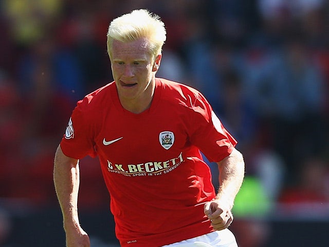 Barnsley's David Perkins in action against Wigan during their Championship match on August 3, 2013