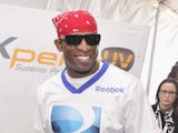 Former NFL/MLB player Deion Sanders attends GBK and DirecTV Celebrity Beach Bowl Thank You Lounge at DTV SuperFan Stadium at Mardi Gras World on February 2, 2013