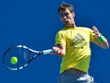 Italy's Fabio Fognini plays a shot during a practice session ahead of the 2014 Australian Open tennis tournament in Melbourne on January 11, 2014