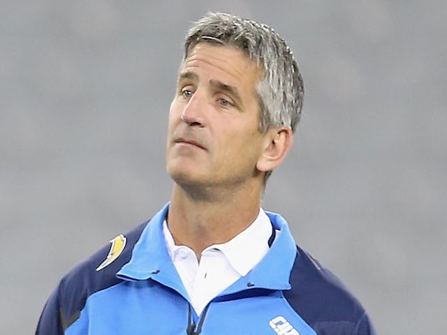 Quarterbacks Coach Frank Reich of the San Diego Chargers talks with quarterback Philip Rivers (L) efore the preseason NFL game against the Arizona Cardinals on August 26, 2014