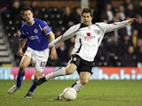 Carlos Bocanegra of Fulham clears the ball from Matty Fryatt of Leicester City during the FA Cup sponsored by E.ON 3rd Round replay match between Fulham and Leicester City at Craven Cottage on January 17, 2007