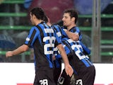 Atalanta's Giacomo Bonaventura celebrates with teammates after scoring the opening goal against Cagliari during their Serie A match on January 19, 2014