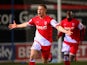 Kidderminster's Jack Byrne celebrates after scoring his team's second goal against Peterborough during their FA Cup third round replay match on January 14, 2014