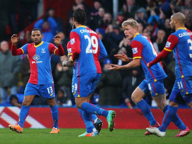 Jason Puncheon of Crystal Palace celebrates scoring the opening goal with team mates during the Barclays Premier League match against Stoke City on January 18, 2014
