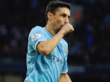 Manchester City's Spanish midfielder Jesus Navas celebrates after scoring his teams second goal during the English Premier League football match against Cardiff City on January 18, 2014