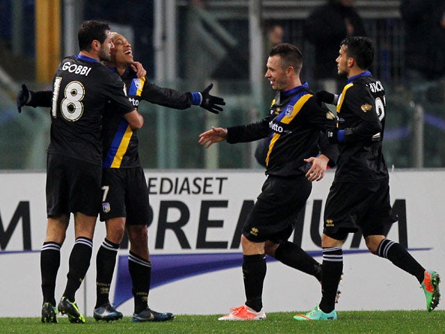 Parma's Jonathan Biabiany celebrates with teammates after scoring his team's first goal against Lazio during their Coppa Italia match on January 14, 2014