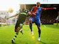 Jonathan Walters of Stoke City is challenged by Adlene Guedioura of Crystal Palace during the Barclays Premier League match on January 18, 2014