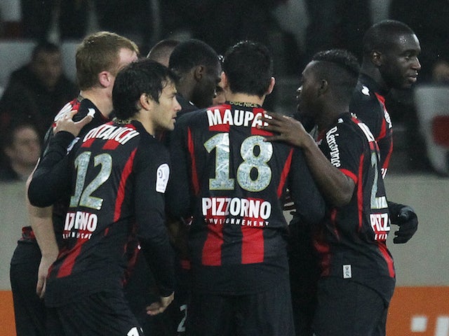 Nice's players celebrate after scoring a goal during the French L1 football match between Nice (OGCN) and Ajaccio (ACA) on January 18, 2014