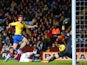 Olivier Giroud of Arsenal scores their second goal past Brad Guzan of Aston Villa during the Barclays Premier League match on January 13, 2014