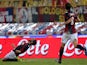 Bologna's Rolando Bianchi celebrates after scoring his team's second goal against Napoli during their Serie A match on January 19, 2014