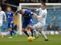 Leeds' Ross McCormack and Leicester's Paul Konchesky in action during their Championship match on January 18, 2014