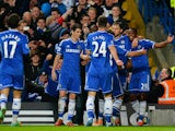 Chelsea's Samuel Eto'o celebrates with teammates after scoring his team's second goal against Man United during their Premier League match on January 19, 2014