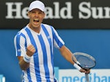 Tomas Berdych celebrates after his win over Kevin Anderson in their Australian Open fourth round match on January 19, 2014