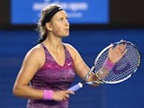 Victoria Azarenka celebrates victory over Yvonne Meusburger in their Australian Open third round match on January 18, 2014