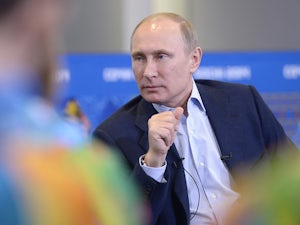 Putin visits Team USA in Sochi