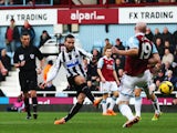 Yohan Cabaye of Newcastle United shoots and scores during the Barclays Premier League match against West Ham United on January 18, 2014