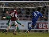 Armand Gnanduillet of Chesterfield scores his sides third goal during the Sky Bet League Two match between Northampton Town and Chesterfield at Sixfields Stadium