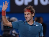 Switzerland's Roger Federer celebrates after victory in his men's singles match against France's Jo-Wilfried Tsonga on day eight of the 2014 Australian Open tennis tournament in Melbourne on January 20, 2014