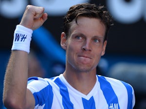 Berdych through at French Open