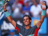 Rafael Nadal of Spain celebrates winning his quarterfinal match against Grigor Dimitrov of Bulgaria during day 10 of the 2014 Australian Open at Melbourne Park on January 22, 2014