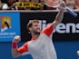 Grigor Dimitrov of Bulgaria celebrates his win over Roberto Bautista Agut of Spain following their men's singles match on day eight of the 2014 Australian Open tennis tournament in Melbourne on January 20, 2014