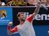 Grigor Dimitrov of Bulgaria celebrates his win over Roberto Bautista Agut of Spain following their men's singles match on day eight of the 2014 Australian Open tennis tournament in Melbourne on January 20, 2014