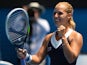 Slovakia's Dominika Cibulkova celebrates after victory in her women's singles match against Russia's Maria Sharapova on day eight of the 2014 Australian Open tennis tournament in Melbourne on January 20, 2014