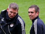 Bastian Schweinsteiger of Bayern Muenchen (C) and team-mate Philipp Lahm during a FC Bayern Muenchen training session ahead of the UEFA Champions League final match against Borussia Dortmund on May 24, 2013