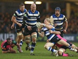 Tom Biggs of Bath looks to offload during the LV Cup match between Bath and Cardiff Blues at the Recreation Ground on January 25, 2014 