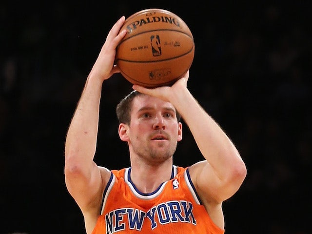 Beno Udrih of the New York Knicks takes a shot against the Boston Celtics at Madison Square Garden on December 8, 2013