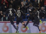 Bordeaux's midfielder Abdou Traore celebrates with teammates after scoring a goal during the French L1 football match between Bordeaux and Saint-Etienne, on January 26, 2014