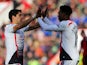 Daniel Sturridge of Liverpool celebrates scoring their second goal with Luis Suarez of Liverpool during the FA Cup Fourth Round match between Bournemouth and Liverpool at Goldsands Stadium on January 25, 2014