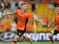 Luke Brattan of the Roar celebrates a goal during the round 16 A-League match between Brisbane Roar and the Wellington Phoenix at Suncorp Stadium on January 24, 2014