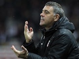 Ajaccio's French interim coach Christian Bracconi gestures during the French L1 football match between Nice (OGCN) and Ajaccio (ACA) on January 18, 2014
