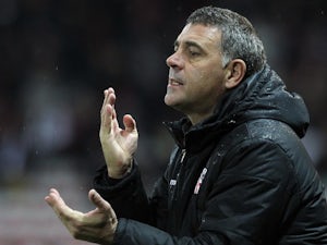 Ajaccio's French interim coach Christian Bracconi gestures during the French L1 football match between Nice (OGCN) and Ajaccio (ACA) on January 18, 2014