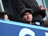 Former Manchester United English midfielder David Beckham attend the the English Premier League football match between Chelsea and Manchester United at Stamford Bridge in London on January 19, 2014