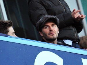 Beckham watches defeat from Abramovich's box