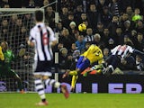 West Brom's Diego Lugano heads in the equalising goal against Everton during their Premier League match on January 20, 2014