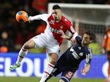 Monaco's French forward Emmanuel Riviere (L) vies for the ball with Marseille's Brazilian defender Lucas Mendes (R) during the French L1 football match on January 26, 2014