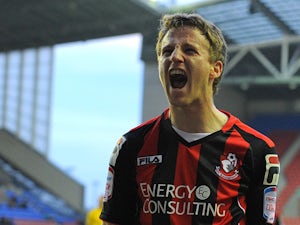 Bournemouth's Irish midfielder Eunan O'Kane celebrates after scoring the opening goal of the English FA Cup third round football match between Wigan Athletic and Bournemouth at The DW Stadium in Wigan, north-west England on January 5, 2013