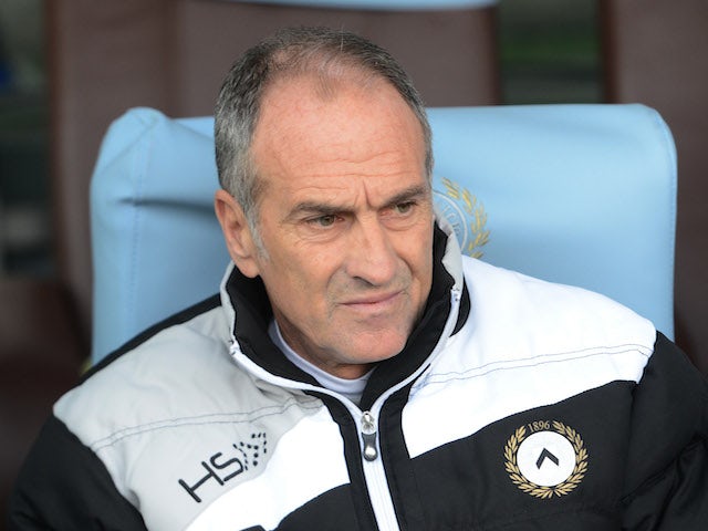 Head coach of Udinese Calcio Francesco Guidolin looks on during the Serie A match between Udinese Calcio and ACF Fiorentina at Stadio Friuli on November 24, 2013