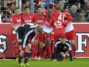 Freiburg boost survival hopes with win