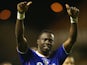 Genseric Kusunga of Oldham celebrates after their victory during the FA Cup First Round Replay match against Wolverhampton Wanderers on November 19, 2013