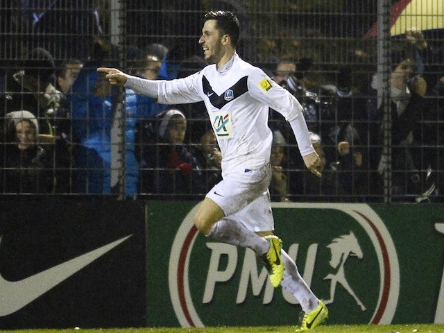Moulins' French midfielder Jason Berthomier celebrates after scoring a goal during a French Cup football match between AS Moulins and Toulouse (TFC) on January 22, 2014